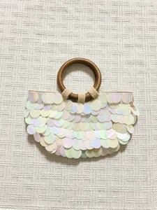 Stylish iridescent sequin handbag with round wooden handle for women fashion evening party summer use.