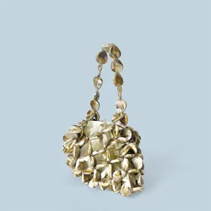 Borsa a mano artigianale con texture in pietra cava e sacchetto interno per accessori moda