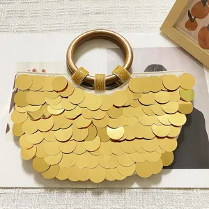 Gold sequin handbag with wooden handle, fashionable round beach tote bag for women daily wear.