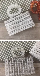 Handmade transparent beaded handbag detail, clear acrylic square tote bag close-up view.