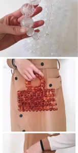 Detailed shot of handmade amber beaded handbag showcasing unique translucent bead design.