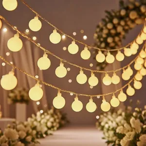 Warm LED string lights detail view, perfect for cozy room decor and romantic outdoor party ambience.
