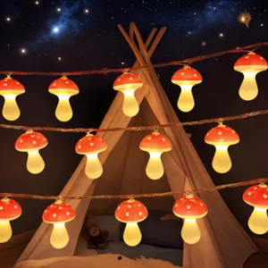 Detailed view of cute LED mushroom string lights creating cozy warm night lighting.