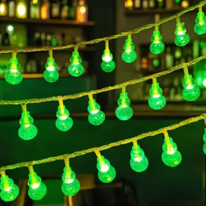 Detailed view of green gourd LED string lights, ideal for ambient and camping decoration.