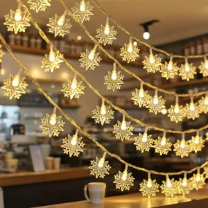 Detailed view of warm LED star string lights hanging gracefully for cozy room and outdoor decor.