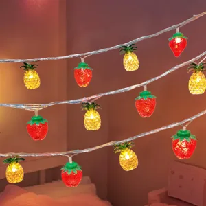 Strawberry and pineapple LED string lights for bedroom aesthetic decor and party lighting.