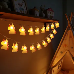LED unicorn string lights detail view, warm fairy lights for kids room decor and bedroom ambiance
