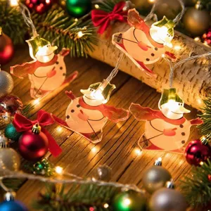 Detailed shot of Christmas solar LED string lights featuring glowing snowman pendants for decor.