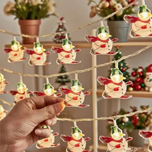 Christmas snowman LED string lights detail view for cozy holiday indoor home decor lighting.