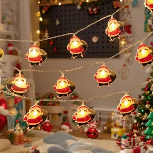 Detailed close-up of LED Santa Claus string lights, warm festive glow for holiday decor.