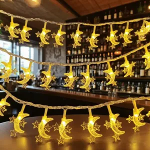 LED star moon string lights detail view showing warm glowing festive atmosphere for room and party decor