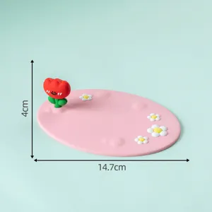 Cute pink silicone coaster with red tulip and white daisy design, non-slip desktop mat.