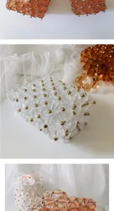 Clear and amber beaded handbag detail view, elegant woven acrylic design with gold accents.
