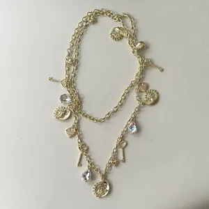 Catena da vita multistrato dorata vintage con ciondoli sole luna cristalli per donna.