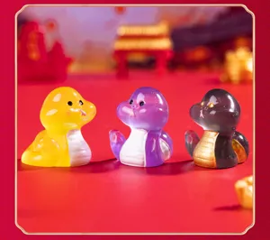 Miniature resin snake figurine, cute Chinese zodiac desktop ornament for New Year DIY craft decor.