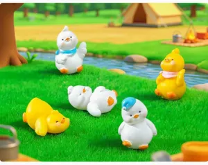 Figurines miniatures de canards jaunes et blancs pour jardin paysager et décoration de bureau.