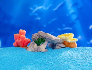 Vue détaillée de l'ornement de paysage d'aquarium en résine avec rocailles et coraux pour aquarium