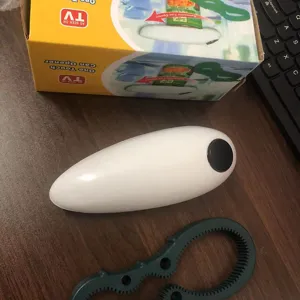 Juego de abrelatas eléctrico automático con herramienta abrefrascos y caja de embalaje.