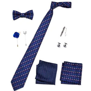 Heren blauwe stropdas set met geometrisch patroon, pochet, vlinderdas en manchetknopen voor pakken.