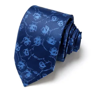 Men's blue jacquard tie detail, elegant floral pattern for business wedding formal wear.