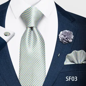 Elegante conjunto de corbata azul y amarillo con pañuelo de bolsillo y gemelos.