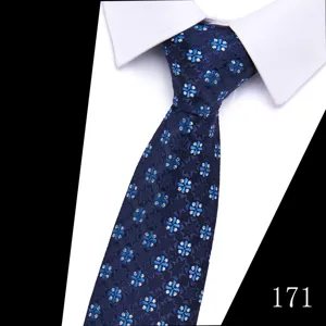 Men's blue jacquard necktie detail view, classic clover pattern formal business wear accessory.