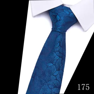 Men's blue floral jacquard tie formal business wedding groom necktie detail view.