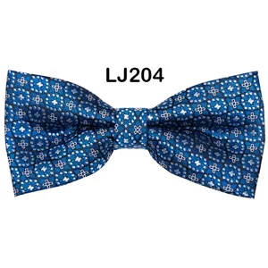 Blue jacquard bow tie detail shot, elegant star pattern men's accessory for wedding.