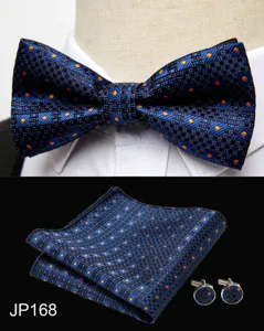 Blue geometric pattern jacquard bow tie pocket square and matching cufflinks set detail view.