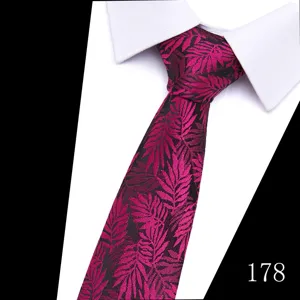 Men's business formal jacquard tie with stylish tropical leaf pattern and pointed tip design.