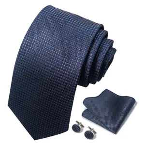 Gedetailleerd overzicht van luxe donkerblauwe gestructureerde stropdas set met pochet en manchet.
