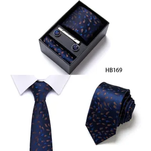Detailed view of men business silk jacquard tie set featuring elegant leaf patterns and accessories.