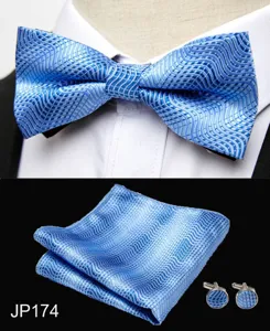 Men blue wavy jacquard bow tie pocket square and cufflinks formal wedding set detail view.