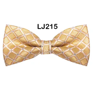 Detailed close-up view of the elegant gold jacquard bow tie with diamond pattern.