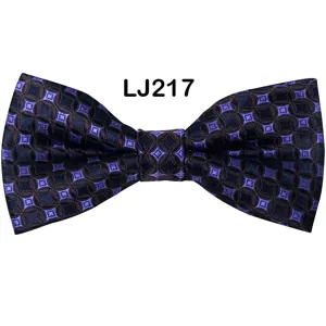 Detail view of a purple geometric jacquard men bow tie, elegant pattern for wedding suits.