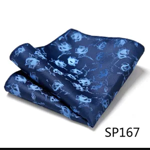 Closeup view of a dark blue pocket square with light blue floral pattern for men formal wear.