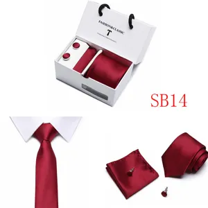 Burgundy silk tie set with pocket square and cufflinks in luxury gift box for men.