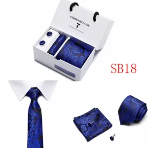 Men's blue paisley tie pocket square cufflinks gift box set detail view showing exquisite jacquard texture.