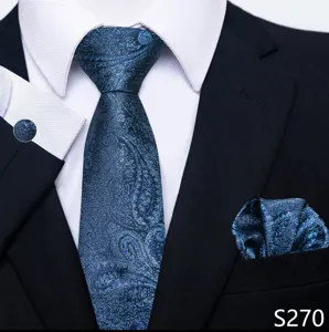 Detail van de blauwe paisley jacquard stropdas set, elegante formele trouwaccessoire voor heren.