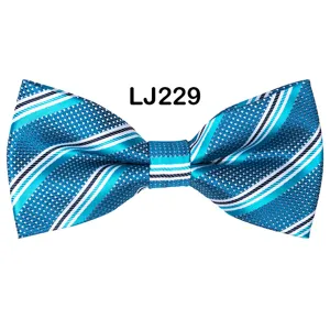 Men's blue striped jacquard bow tie detail shot, elegant formal accessory for wedding party.