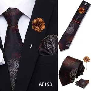 Detailed view of the jacquard mens tie set featuring flower pattern pocket square and lapel pin