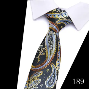 Detailed shot of a classic paisley jacquard men necktie with elegant blue and gold patterns.