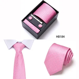 Pink jacquard tie set details, featuring matching pocket square, cufflinks, and gift box.