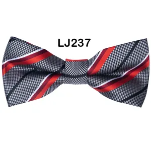 Detail view of the stylish men's bow tie with diagonal red white and black striped pattern.