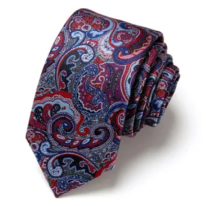 Detailed view of mens formal tie with red blue jacquard paisley pattern for business wear.