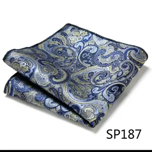 Close-up detail of a blue and gold paisley pocket square, elegant silk-like fabric for suits.