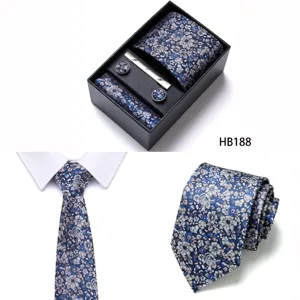 Detailed view of the blue floral jacquard tie set featuring matching pocket square and cufflinks.