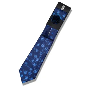 Blue floral silk tie set for men, featuring pocket square and lapel pin brooch, stylish design.