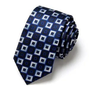 Detail of blue and black geometric pattern jacquard necktie fabric texture close up view.