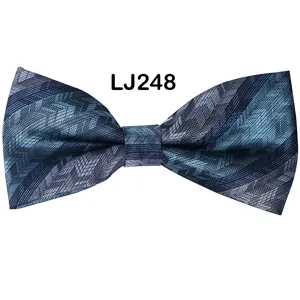 Detail view of blue star jacquard bow tie, elegant men polyester fabric accessory.